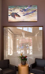 Framed artwork installed in an office